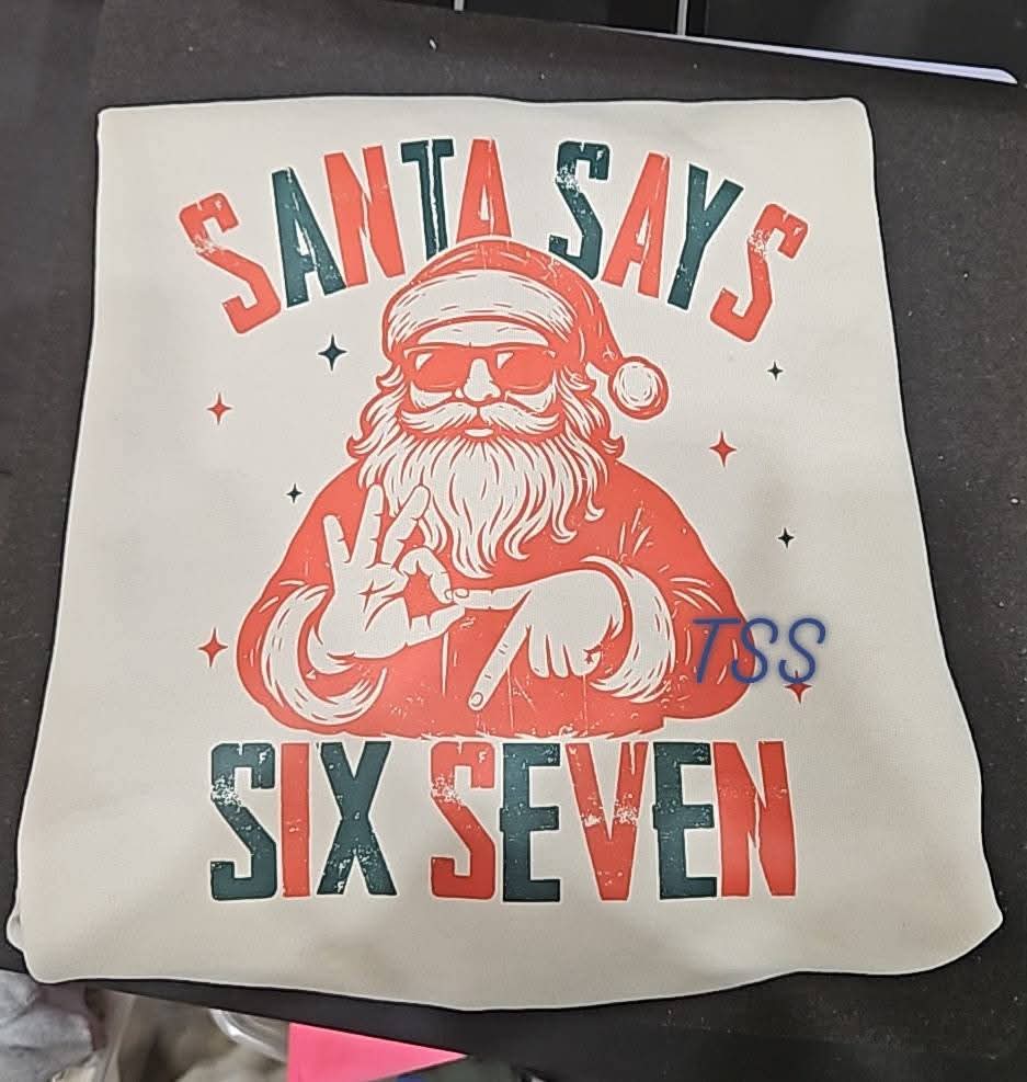 Classic Red and Green Santa says 6-7